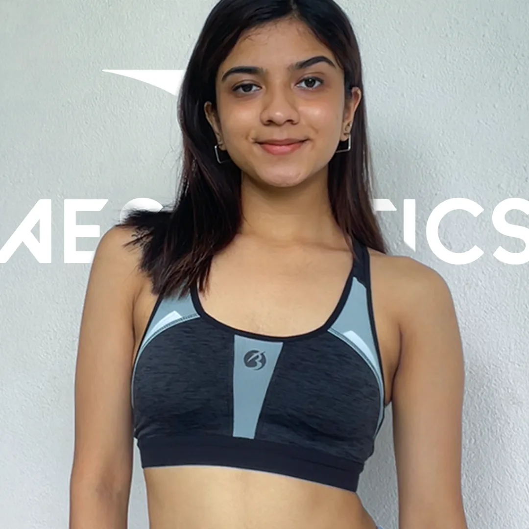 dark gray and green sports bra