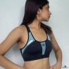 dark gray and green sports bra