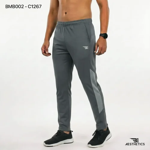 Men's athletic track bottoms showcasing breathable side seam mesh ventilation