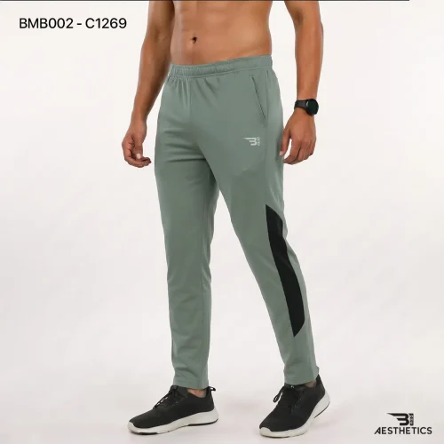 Men's athletic track bottoms showcasing breathable side seam mesh ventilation