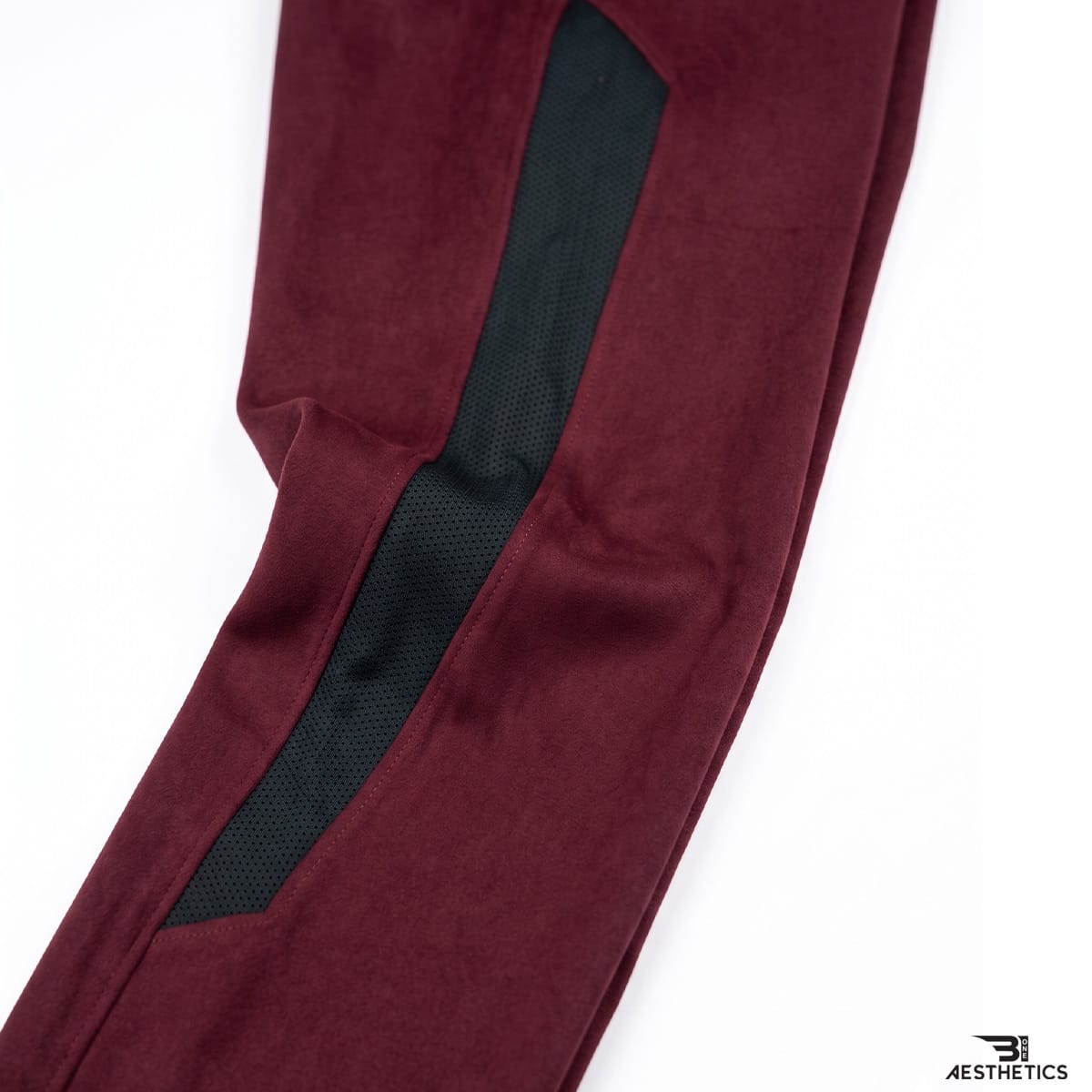 Men's premium joggers highlighting innovative contrast side panel and mesh ventilation line