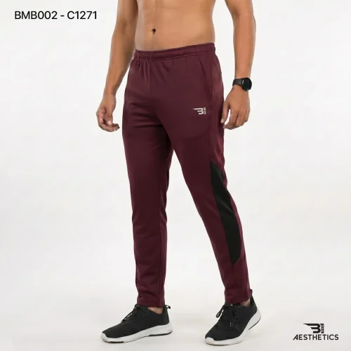Men's athletic track bottoms showcasing breathable side seam mesh ventilation