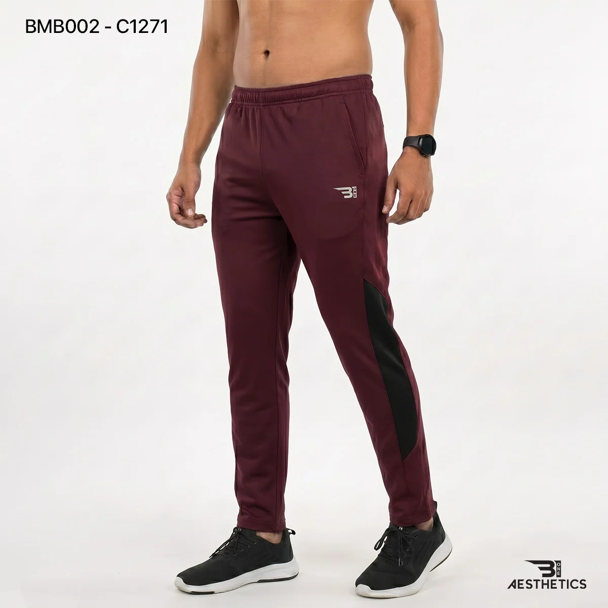 Men's athletic track bottoms showcasing breathable side seam mesh ventilation
