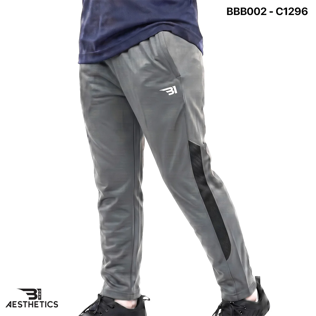 Boys sports track bottoms side view highlighting breathable mesh panel