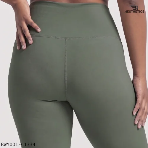 Back view of Artichoke Green high waist yoga pants showing curve-hugging fit