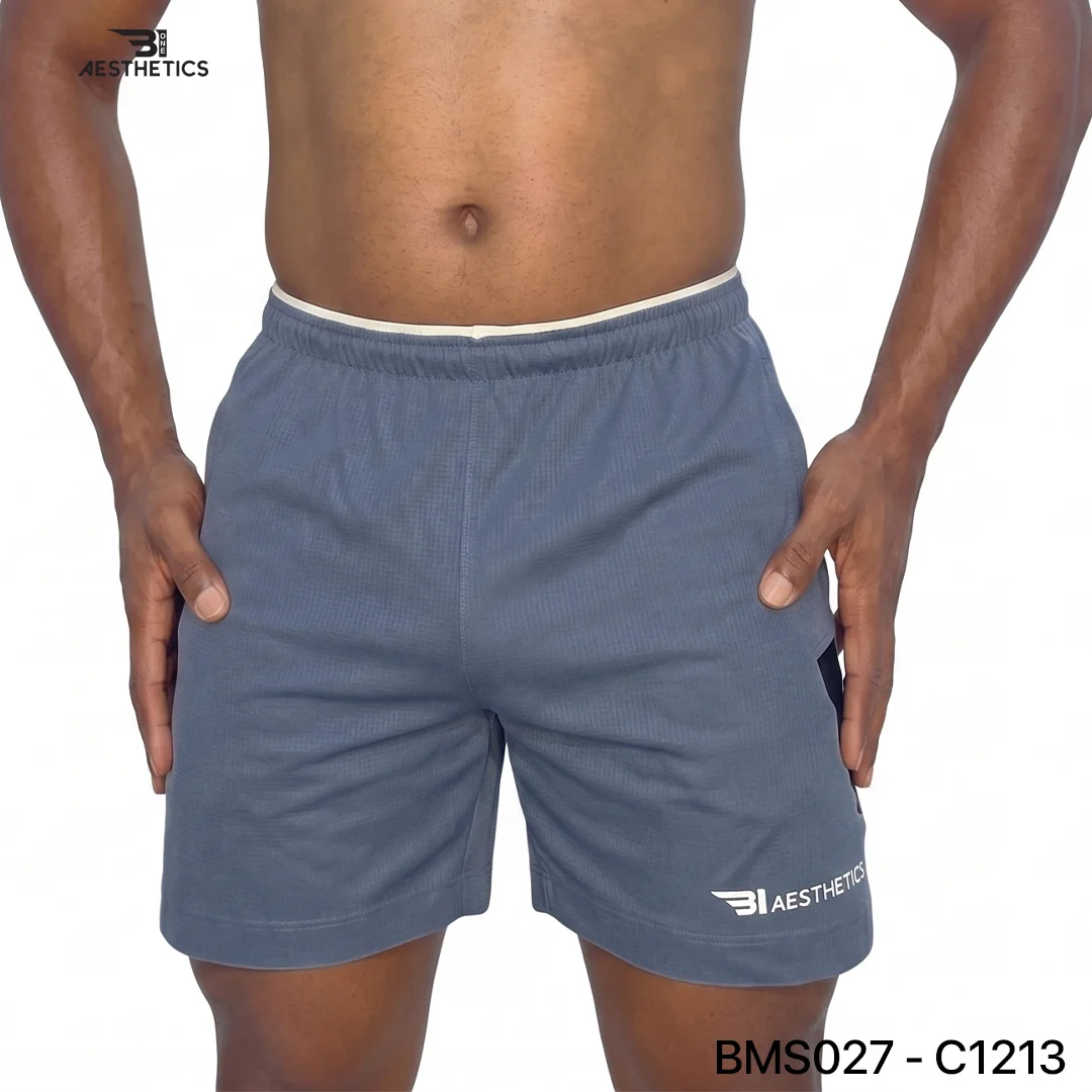 Athlete stretching legs wearing Zipper Pocket Shorts with side contrast panel