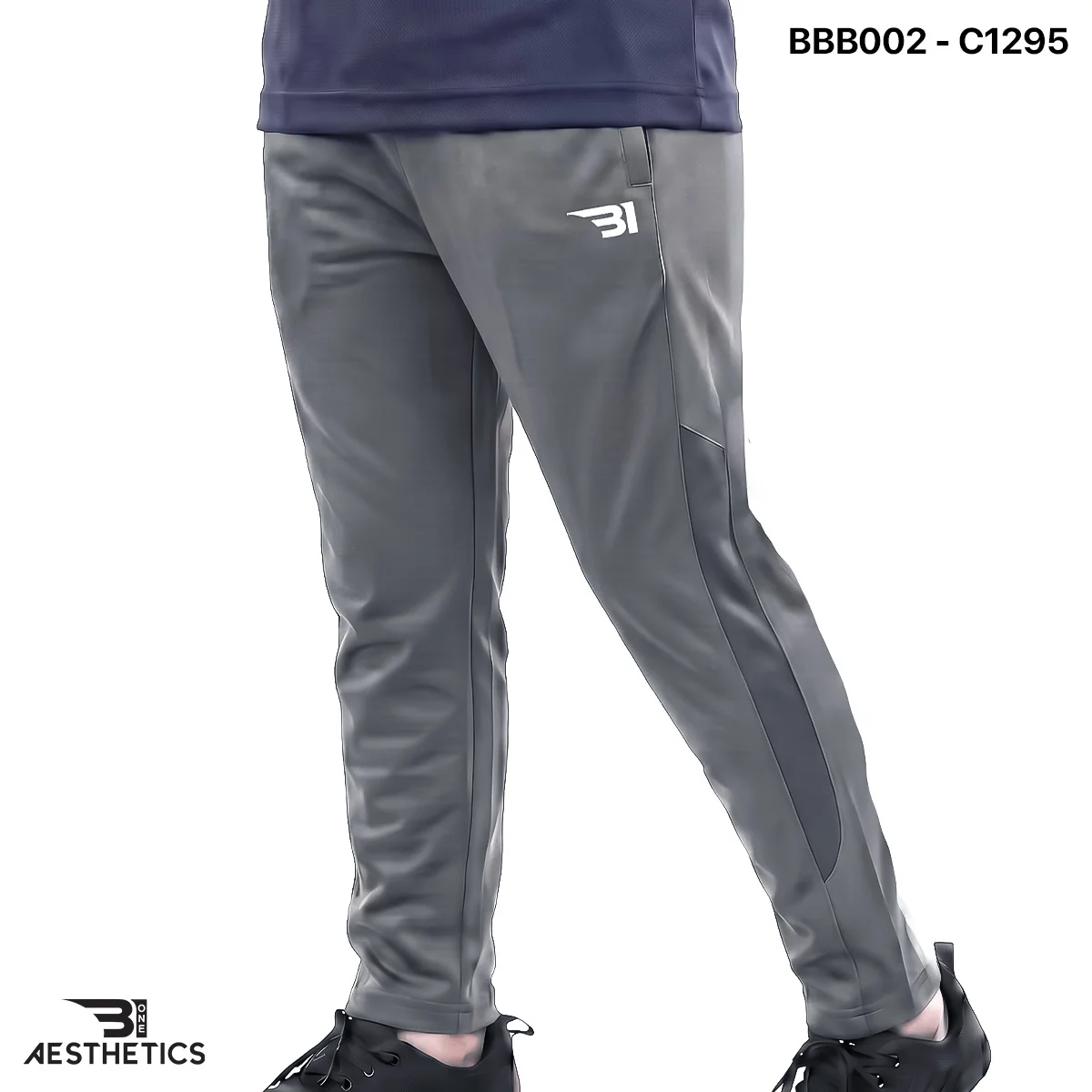 Boys sports track bottoms side view highlighting breathable mesh panel