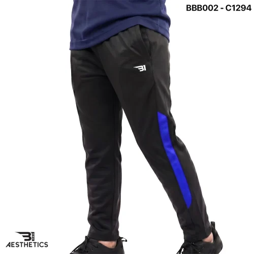 Boys sports track bottoms side view highlighting breathable mesh panel