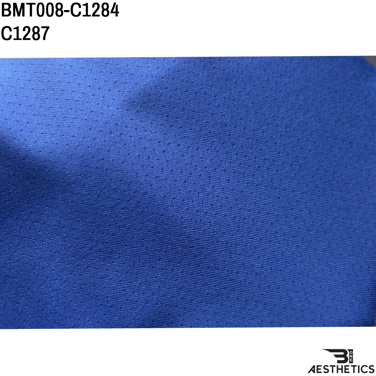Close up of premium breathable dry fit fabric texture and stitching detail