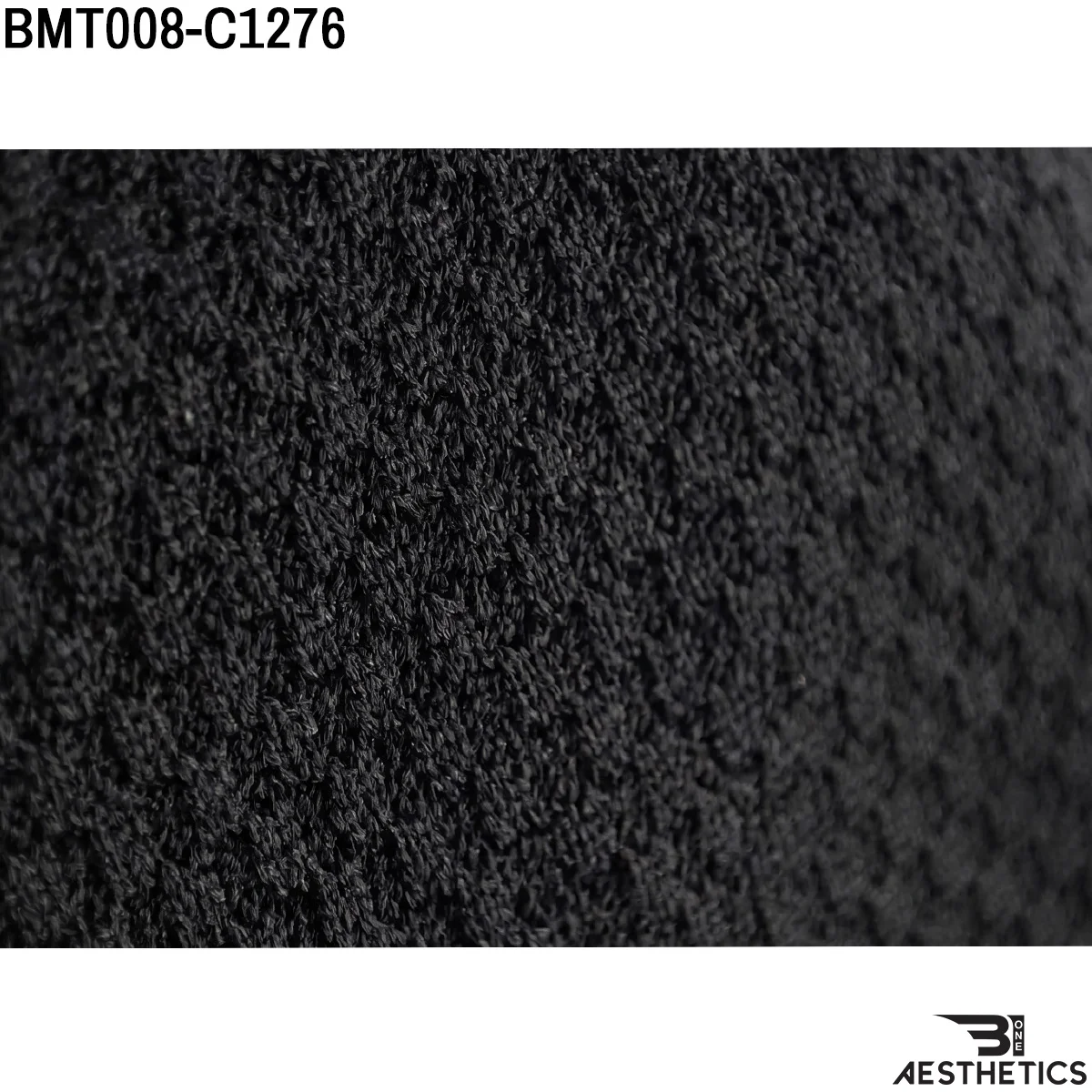 Close up of premium breathable dry fit fabric texture and stitching detail