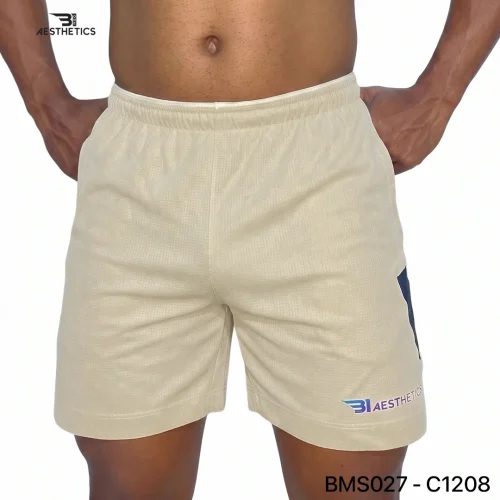 Athlete stretching legs wearing Zipper Pocket Shorts with side contrast panel