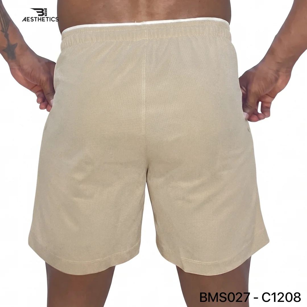 Athlete stretching legs wearing Zipper Pocket Shorts with side contrast panel