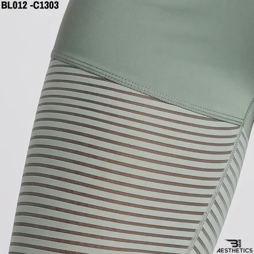 Close up of women's leggings featuring stripe patterned see through mesh ventilation