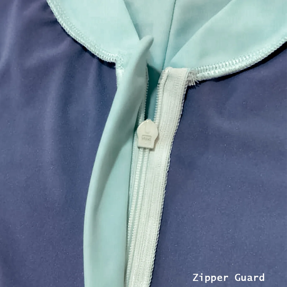 Women's one piece swimsuit interior zipper guard for skin protection