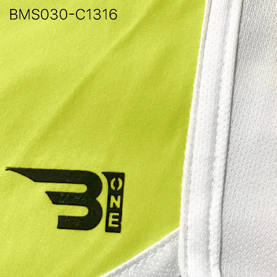 Close up of practice short breathable eyelet mesh fabric and high-density logo