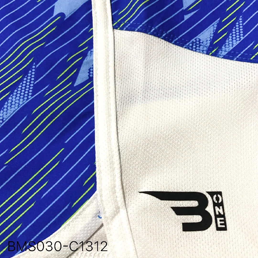 Close up of practice short breathable eyelet mesh fabric and high-density logo