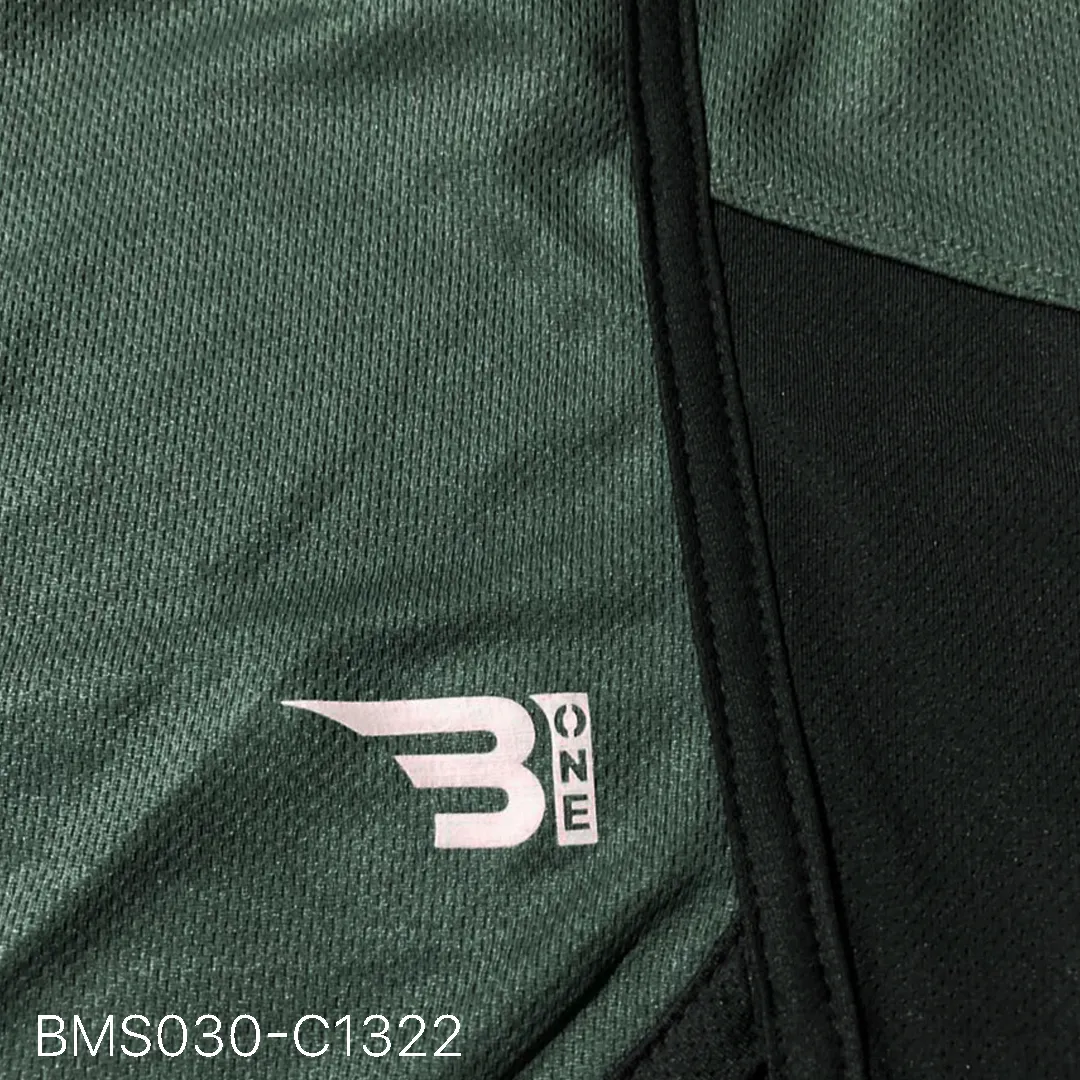 Close up of practice short breathable eyelet mesh fabric and high-density logo