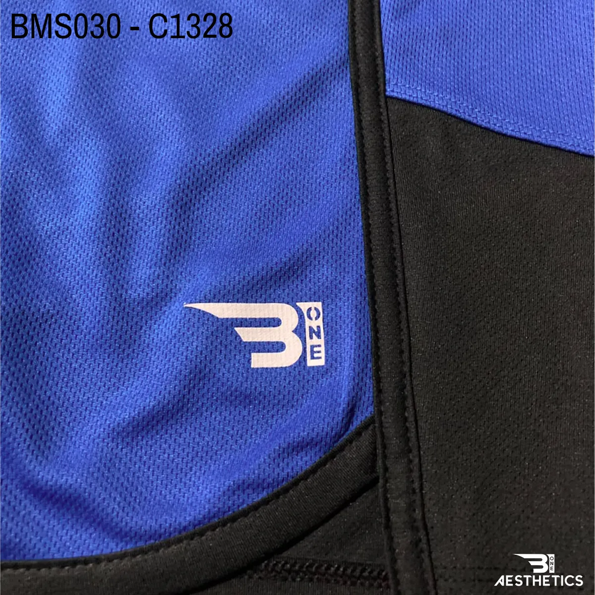 Close up of practice short breathable eyelet mesh fabric and high-density logo