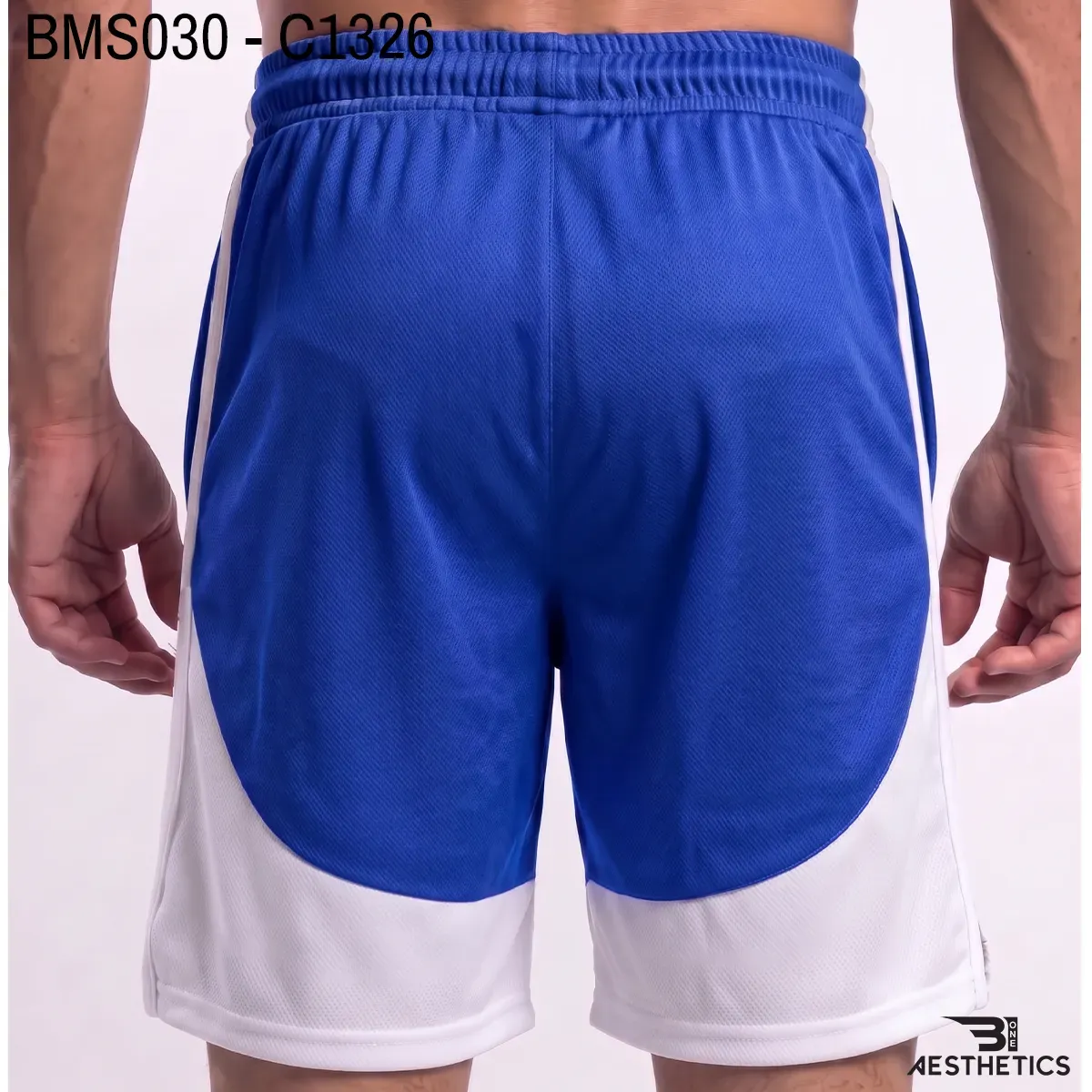 Men's athletic practice short back profile view with curved contrast paneling