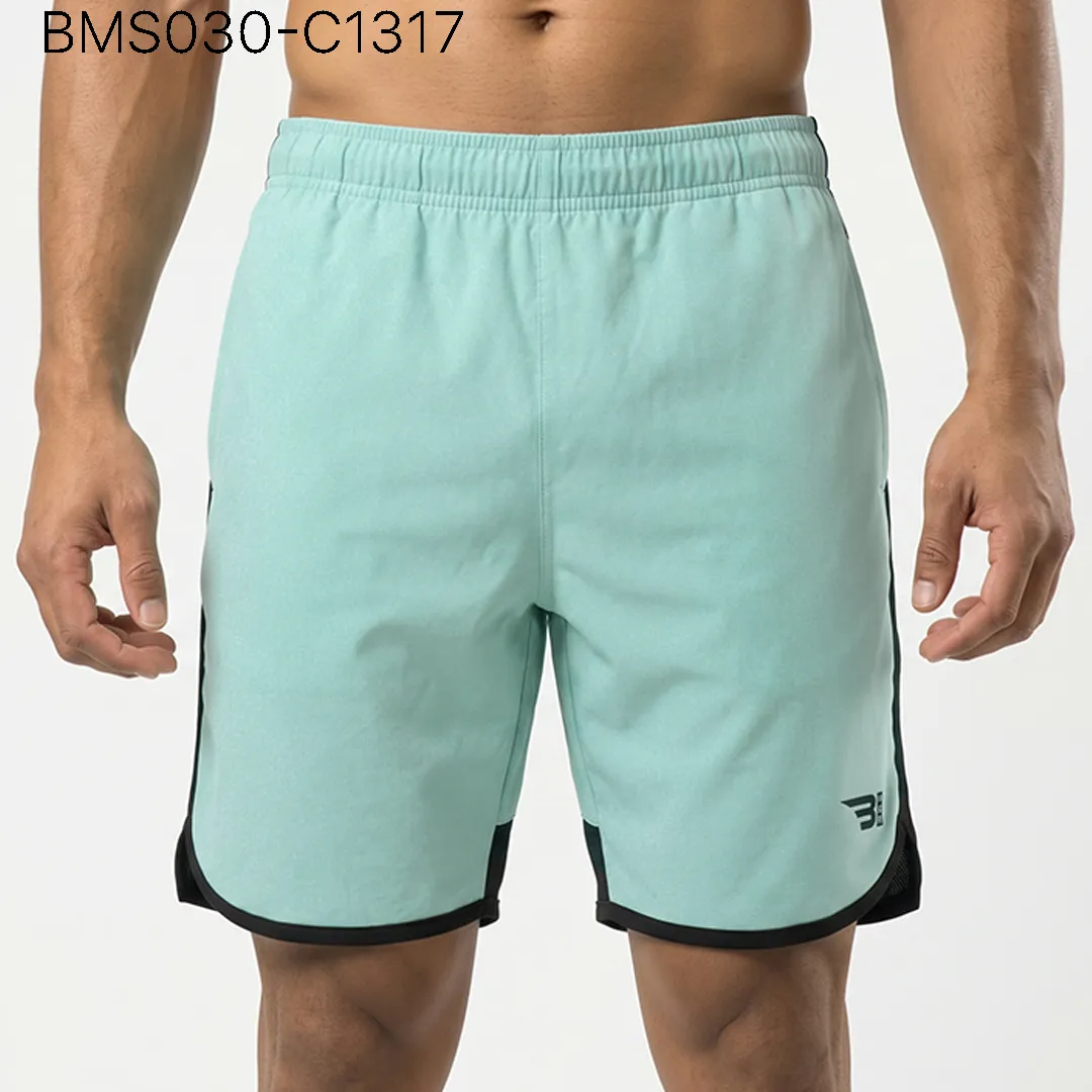 Men's practice short front view showing elastic waistband and curved hem split