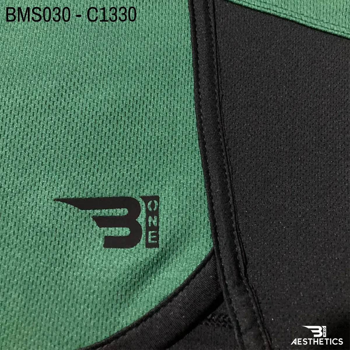 Close up of practice short breathable eyelet mesh fabric and high-density logo