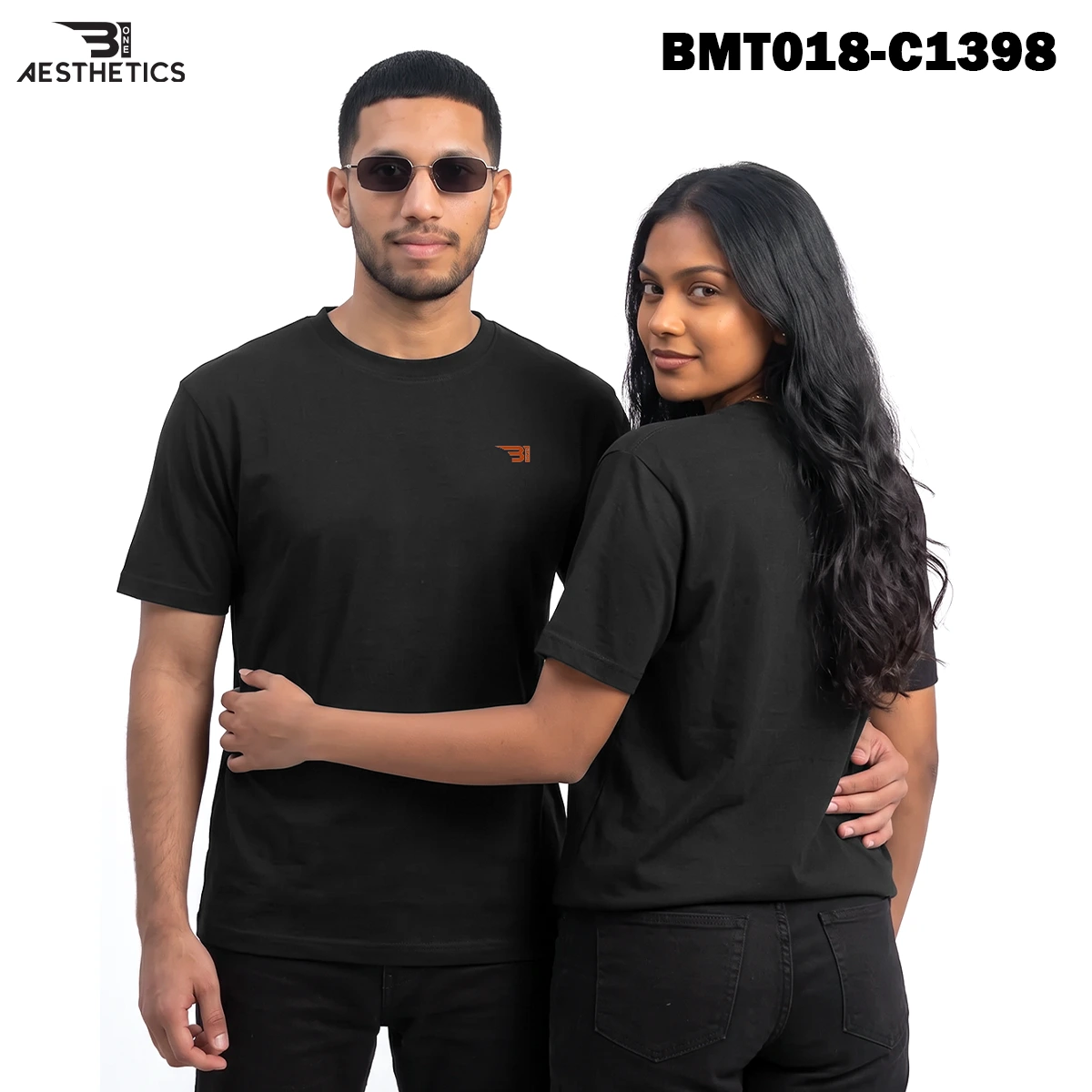 Unisex oversized t-shirt worn by couple showcasing relaxed streetwear fit
